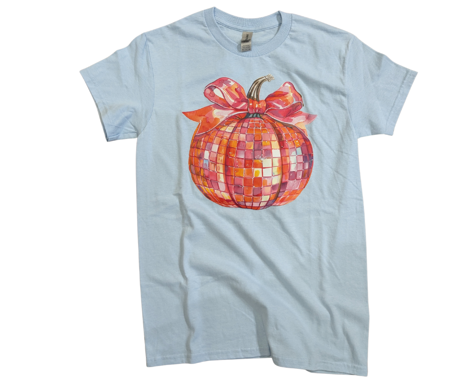 Light blue t-shirt with a colorful pumpkin and bow design on a white background