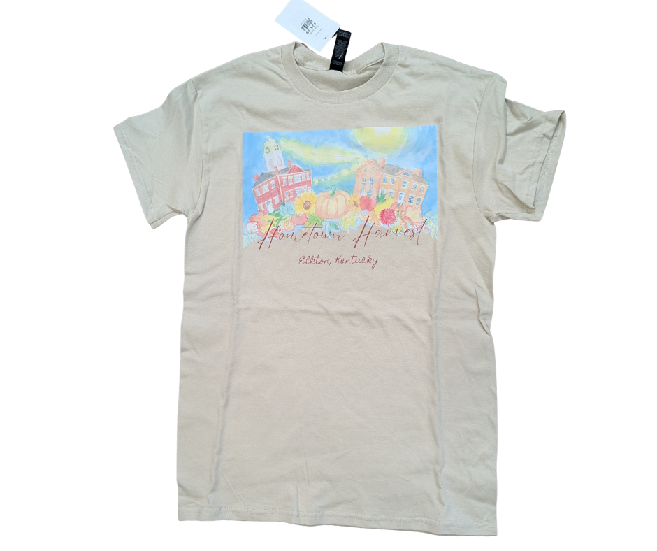 Beige t-shirt with a colorful graphic and text on a white background