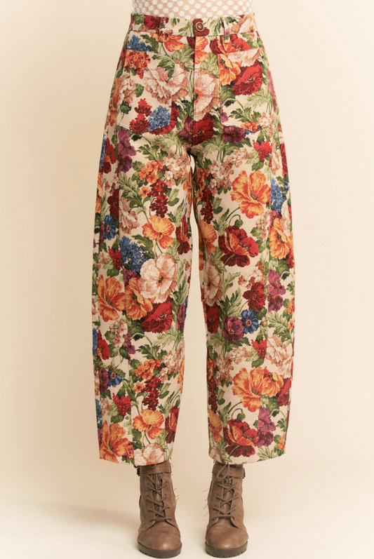 Floral patterned pants on a plain background