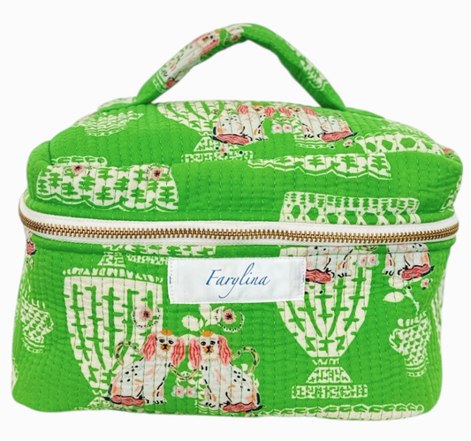 Green patterned fabric box with a visible brand label on a white background